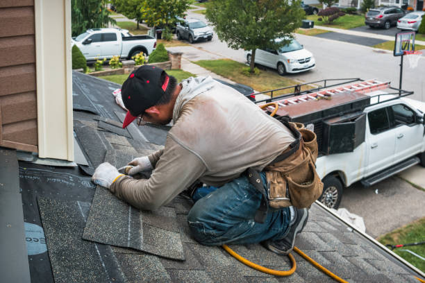 Professional Gutter Installation technician working in Woodland, PA